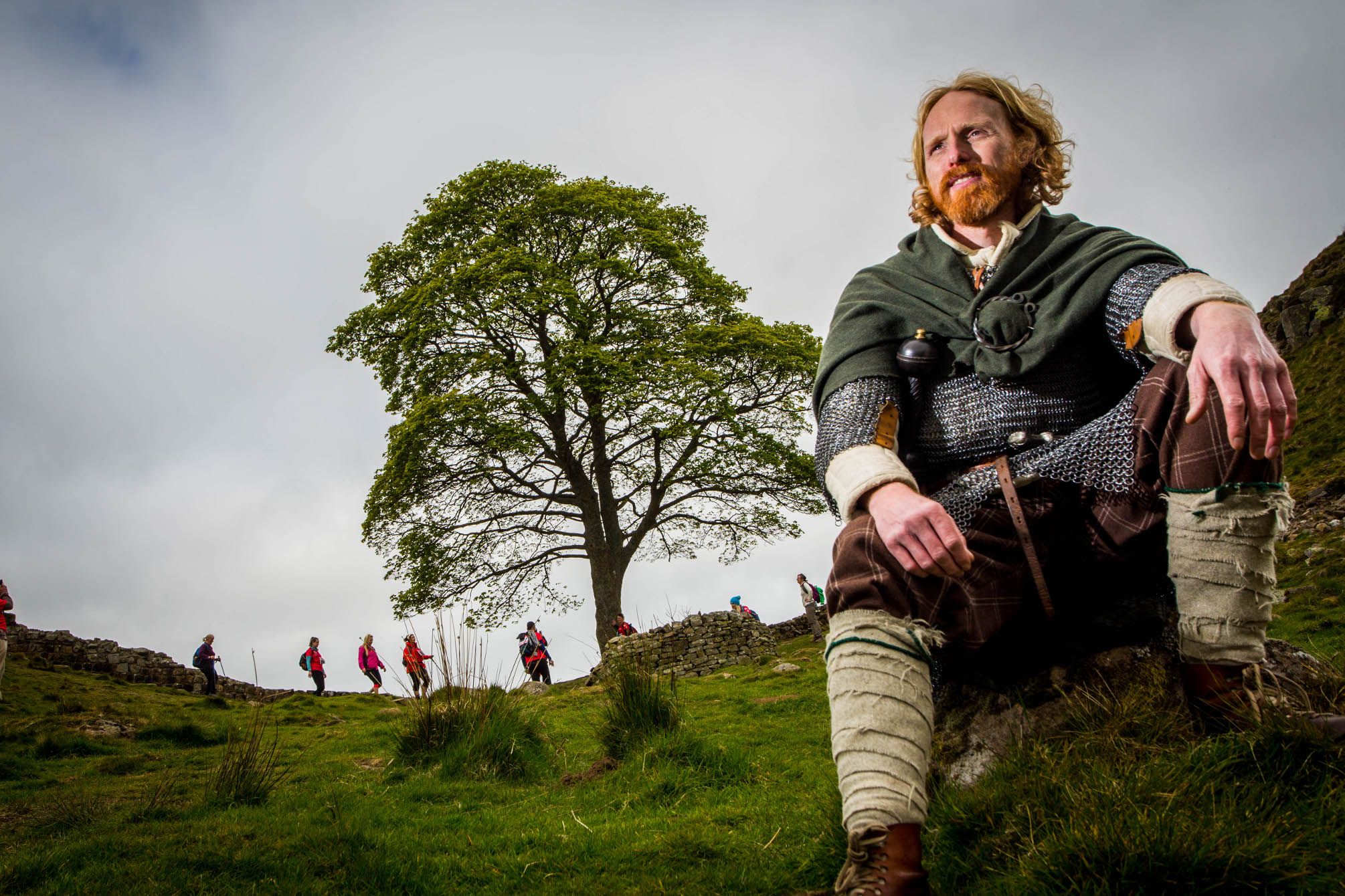 A Roman sitting at Sycamore Gap on Hadrian's Wall